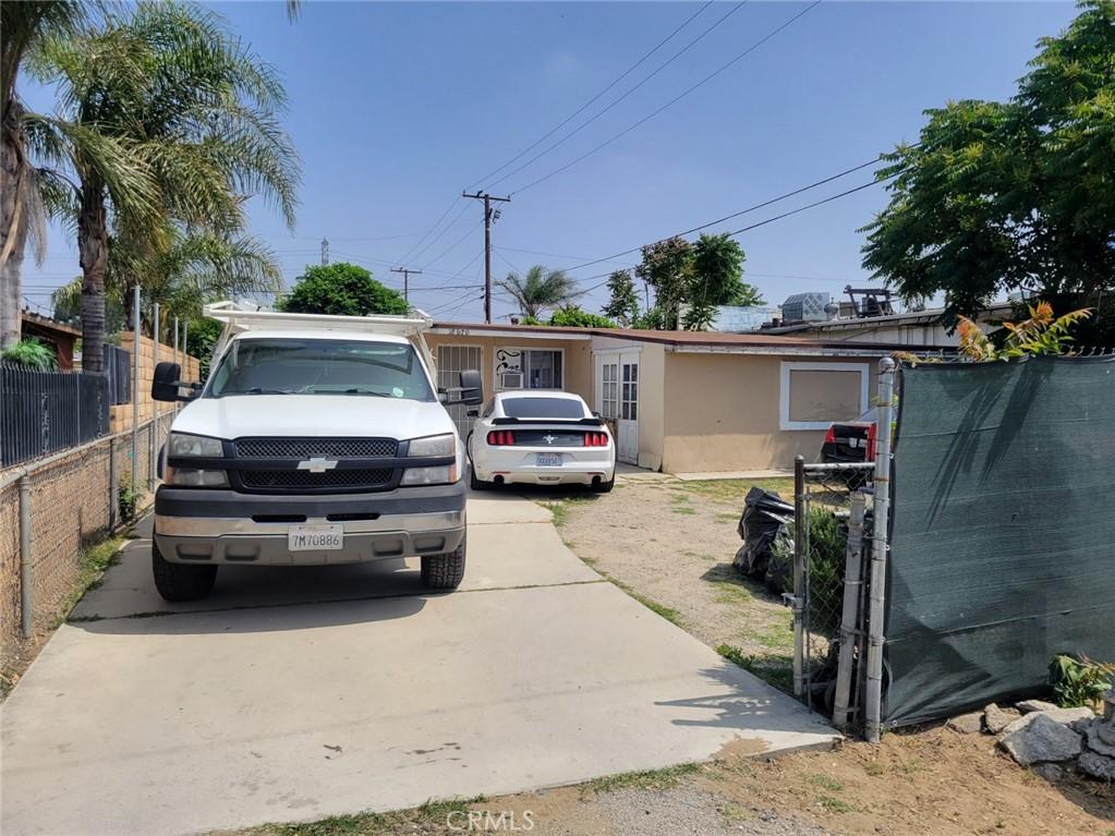 18670 9th St, Bloomington, CA 92316 - ranch-style house featuring stucco siding and fence