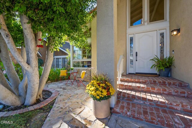 22671 Cheryl Way, Lake Forest, CA 92630 - doorway to property featuring stucco siding