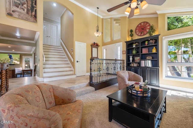 22671 Cheryl Way, Lake Forest, CA 92630 - carpeted living area with ornamental molding, arched walkways, plenty of natural light, a ceiling fan, and a high ceiling