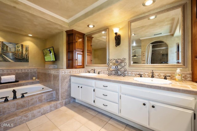 22671 Cheryl Way, Lake Forest, CA 92630 - bathroom featuring ornamental molding, tile patterned floors, double vanity, a shower stall, and a bath
