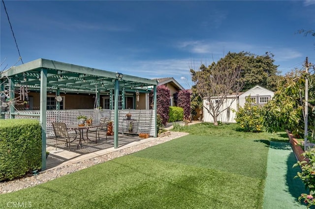 16372 Hollywood Ln, Huntington Beach, CA 92649 - view of yard with a pergola, an outbuilding, and a patio