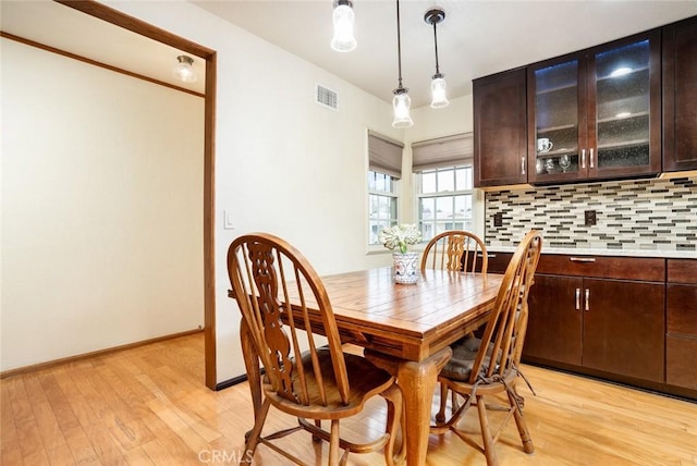 16372 Hollywood Ln, Huntington Beach, CA 92649 - dining space with light wood finished floors, baseboards, and visible vents