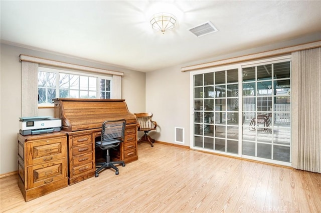 16372 Hollywood Ln, Huntington Beach, CA 92649 - office area with baseboards, visible vents, and wood finished floors