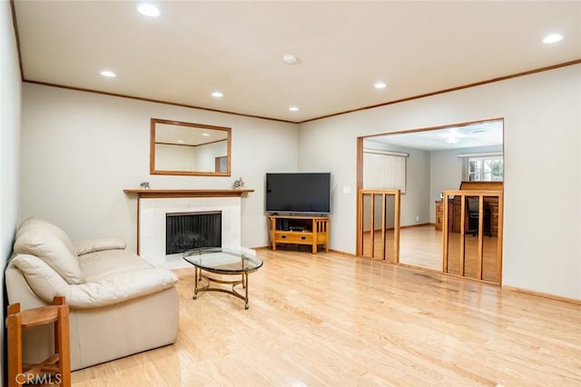 16372 Hollywood Ln, Huntington Beach, CA 92649 - living room with recessed lighting, a fireplace with flush hearth, baseboards, and wood finished floors