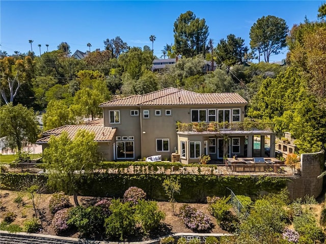 2107 Lemon Heights Dr, Santa Ana, CA 92705 - back of property featuring a tile roof and stucco siding
