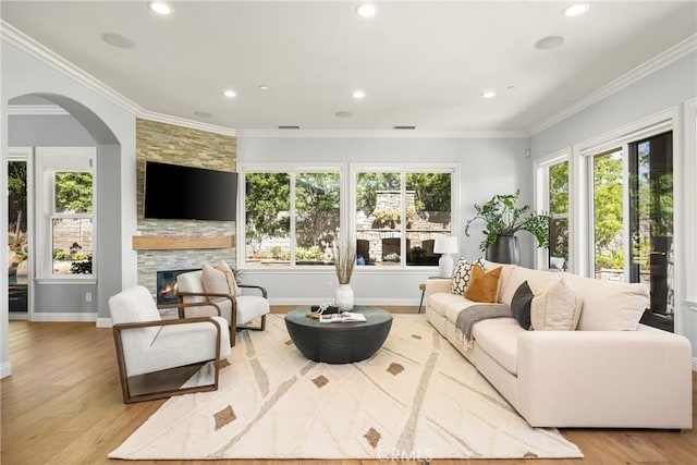 2107 Lemon Heights Dr, Santa Ana, CA 92705 - living room featuring baseboards, recessed lighting, wood finished floors, and a fireplace