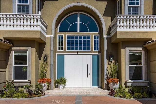 2107 Lemon Heights Dr, Santa Ana, CA 92705 - doorway to property featuring stucco siding