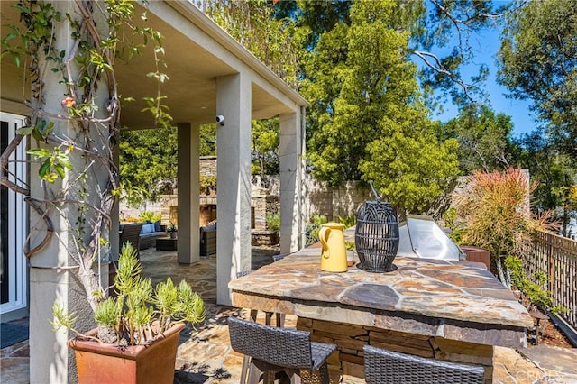 2107 Lemon Heights Dr, Santa Ana, CA 92705 - view of patio / terrace featuring outdoor lounge area and fence