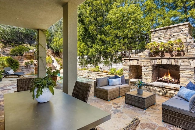 2107 Lemon Heights Dr, Santa Ana, CA 92705 - view of patio / terrace with an outdoor living space with a fireplace, outdoor dining space, and a fenced backyard
