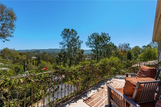 2107 Lemon Heights Dr, Santa Ana, CA 92705 - balcony featuring a view of trees