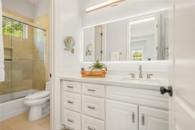 2107 Lemon Heights Dr, Santa Ana, CA 92705 - full bathroom featuring tile patterned floors, toilet, vanity, and enclosed tub / shower combo