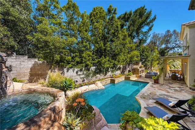 2107 Lemon Heights Dr, Santa Ana, CA 92705 - outdoor pool with a patio, an in ground hot tub, a fenced backyard, and an outdoor stone fireplace