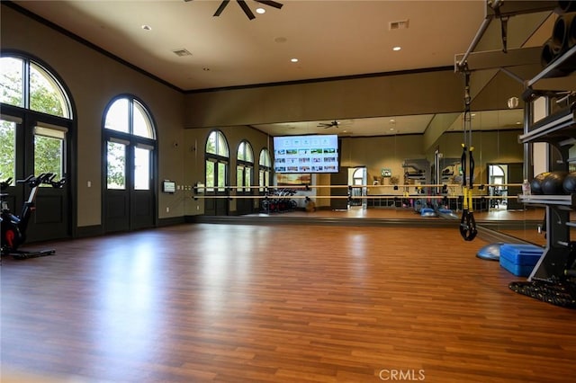 24128 Rimstone Dr, Corona, CA 92883 - exercise room with crown molding, a ceiling fan, visible vents, recessed lighting, and wood finished floors