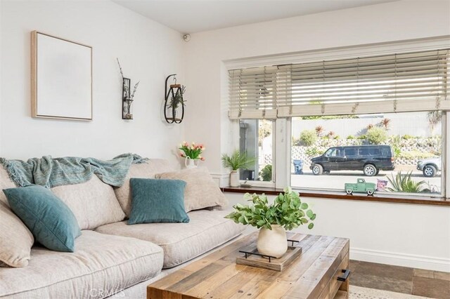 7612 Appleby, Huntington Beach, CA 92648 - living area featuring baseboards