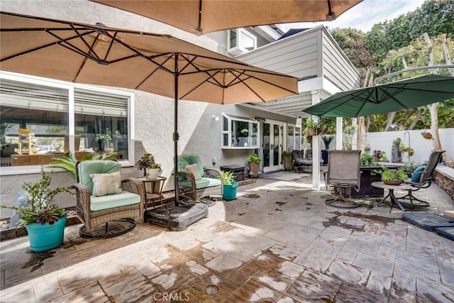 7612 Appleby, Huntington Beach, CA 92648 - view of patio / terrace with fence, outdoor dining area, and french doors