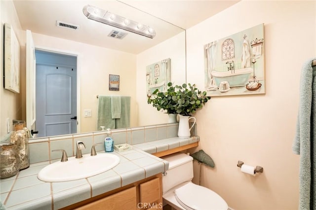 7612 Appleby, Huntington Beach, CA 92648 - bathroom featuring toilet, vanity, and visible vents