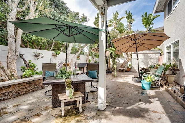7612 Appleby, Huntington Beach, CA 92648 - view of patio / terrace with outdoor dining area and a fenced backyard