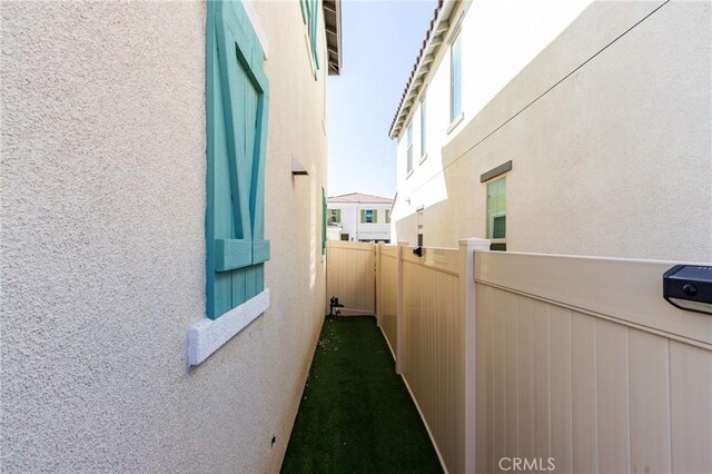 972 W Jasmine Way, Rialto, CA 92376 - view of side of home with stucco siding