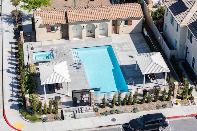 972 W Jasmine Way, Rialto, CA 92376 - aerial view of property and surrounding area featuring a pool area