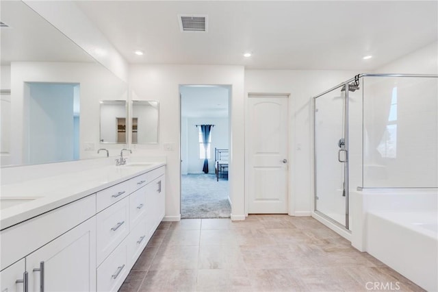 972 W Jasmine Way, Rialto, CA 92376 - bathroom with a shower stall, double vanity, a garden tub, recessed lighting, and tile patterned floors