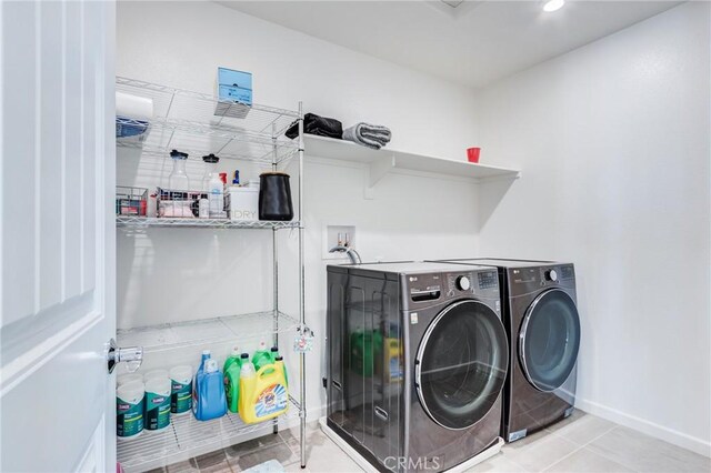 972 W Jasmine Way, Rialto, CA 92376 - washroom with washing machine and dryer and tile patterned floors