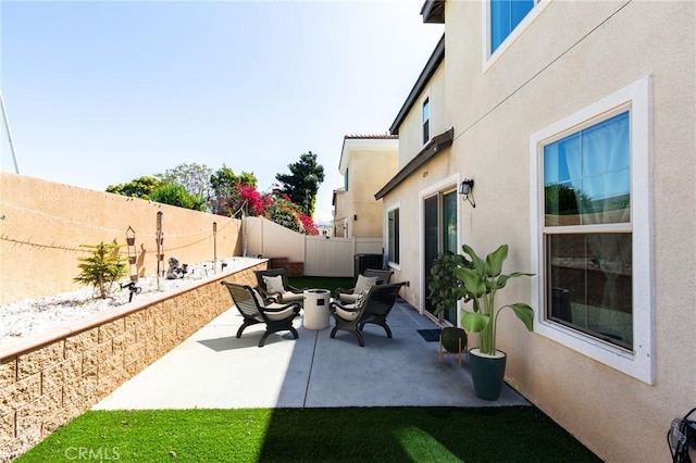 972 W Jasmine Way, Rialto, CA 92376 - fenced backyard with a patio area and an outdoor fire pit