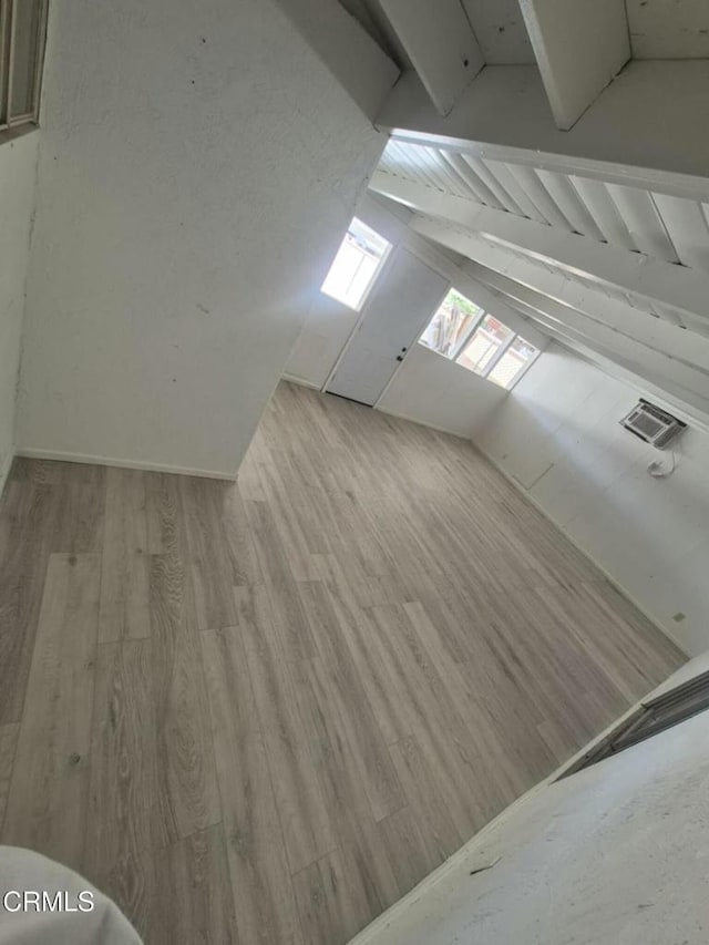 391 N 9th St, Blythe, CA 92225 - bonus room featuring wood finished floors and vaulted ceiling with beams
