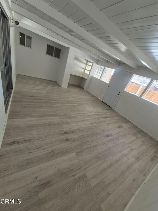 391 N 9th St, Blythe, CA 92225 - interior space with a wealth of natural light, wood finished floors, beamed ceiling, and wooden ceiling