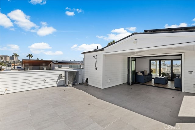view of patio featuring an outdoor hangout area and central AC unit