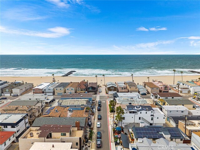 bird's eye view featuring a beach view, a residential view, and a water view