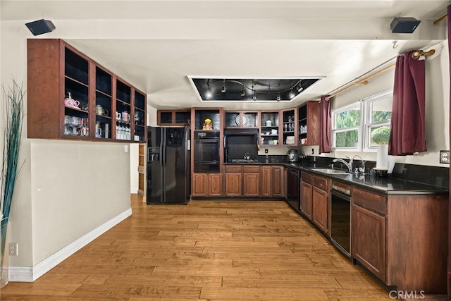 13771 De Garmo Ave, Rancho Cascades, CA 91342 - kitchen with black appliances, open shelves, a sink, light wood finished floors, and dark countertops
