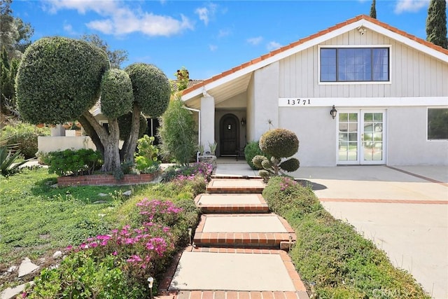 13771 De Garmo Ave, Rancho Cascades, CA 91342 - view of front of home featuring stucco siding