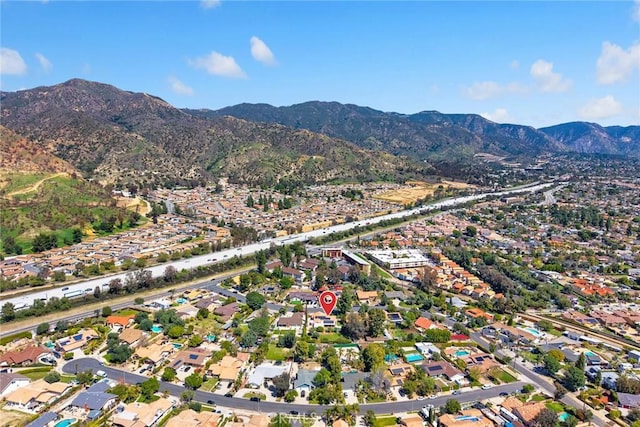 13771 De Garmo Ave, Rancho Cascades, CA 91342 - aerial view of property's location featuring a mountain backdrop and nearby suburban area