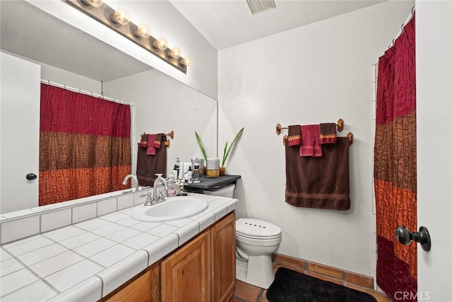 13771 De Garmo Ave, Rancho Cascades, CA 91342 - bathroom featuring toilet, vanity, and curtained shower