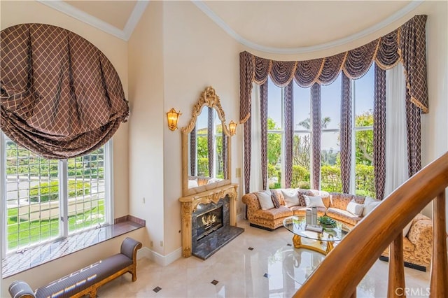 8113 Newcastle Dr, Whittier, CA 90605 - sitting room featuring ornamental molding, tile patterned flooring, a high end fireplace, and baseboards
