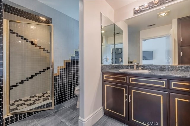 8113 Newcastle Dr, Whittier, CA 90605 - full bathroom with tile patterned floors, a shower stall, toilet, vanity, and visible vents