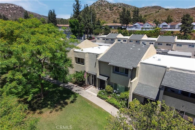 bird's eye view featuring a mountain view and a residential view