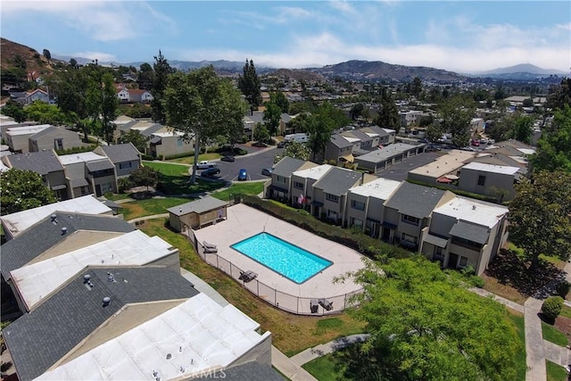 birds eye view of property with a residential view and a mountain view