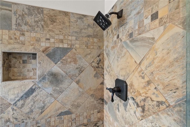 details featuring tiled shower