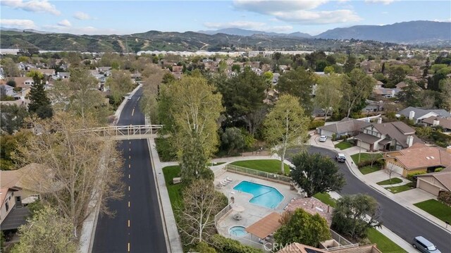 aerial view featuring a mountain view and a residential view