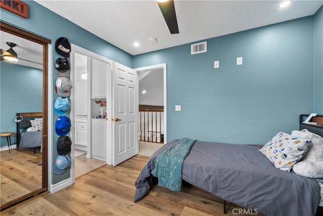bedroom with visible vents, ceiling fan, light wood-type flooring, and recessed lighting
