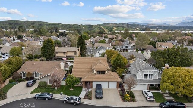 birds eye view of property featuring a residential view and a mountain view