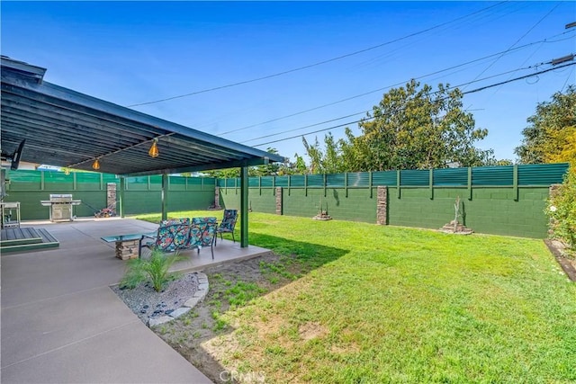 7451 Western Ave, Buena Park, CA 90620 - view of yard featuring a patio and a fenced backyard