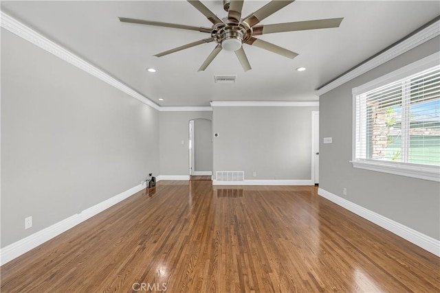 7451 Western Ave, Buena Park, CA 90620 - unfurnished living room with arched walkways, visible vents, crown molding, and ceiling fan
