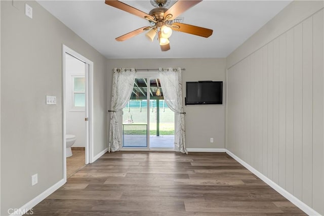 7451 Western Ave, Buena Park, CA 90620 - interior space featuring wood finished floors, a ceiling fan, and baseboards
