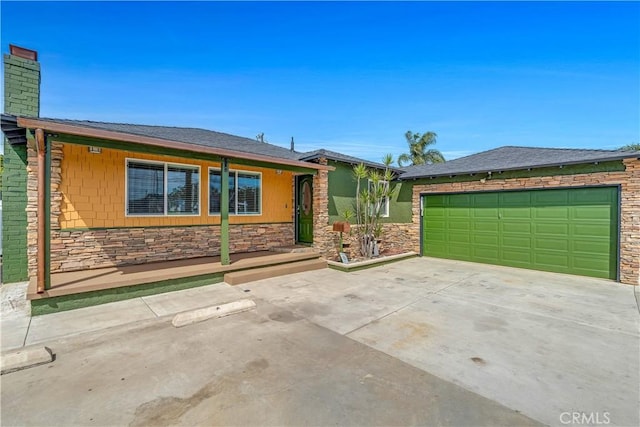 7451 Western Ave, Buena Park, CA 90620 - view of front facade with stone siding and a chimney