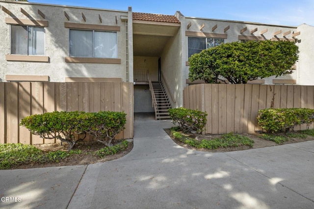 2538 Bolker Dr, Port Hueneme, CA 93041 - view of exterior entry featuring stucco siding and a tiled roof