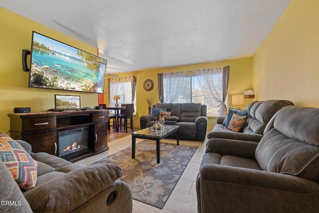 2538 Bolker Dr, Port Hueneme, CA 93041 - living room with light tile patterned floors and a glass covered fireplace