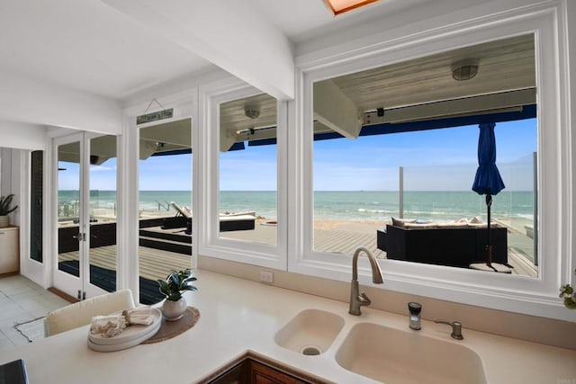 35321 Beach Rd, Dana Point, CA 92624 - interior space with plenty of natural light, a water view, and a sink