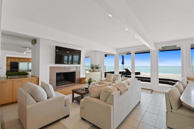 35321 Beach Rd, Dana Point, CA 92624 - living area with beamed ceiling, a premium fireplace, and light tile patterned floors